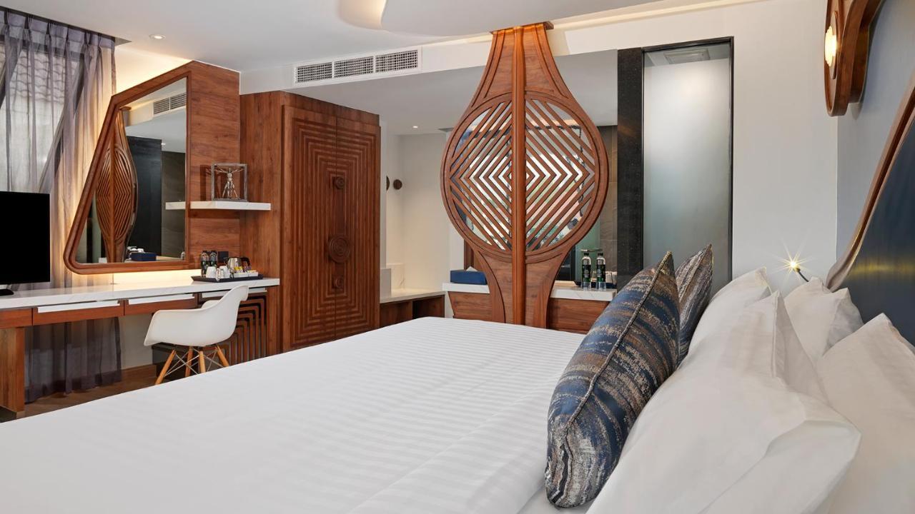 The Oceanic Sportel Phuket - Sha Extra Plus Eksteriør bilde A bedroom at the hotel