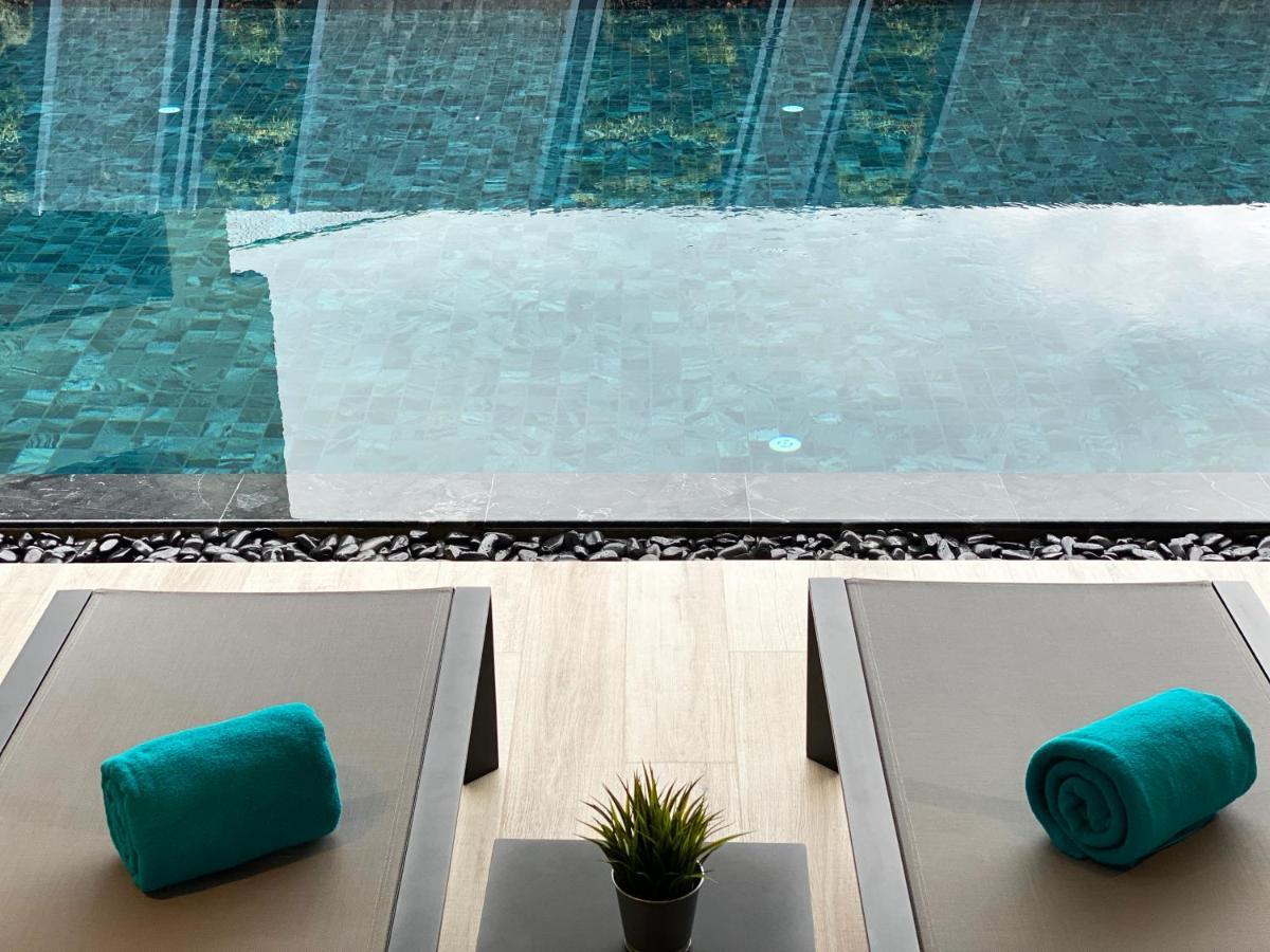 The Oceanic Sportel Phuket - Sha Extra Plus Eksteriør bilde The swimming pool at the hotel